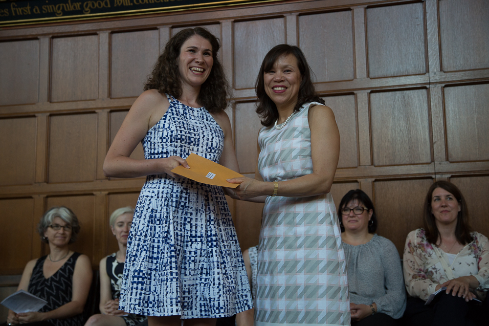 Students receive awards at a reception following convocation