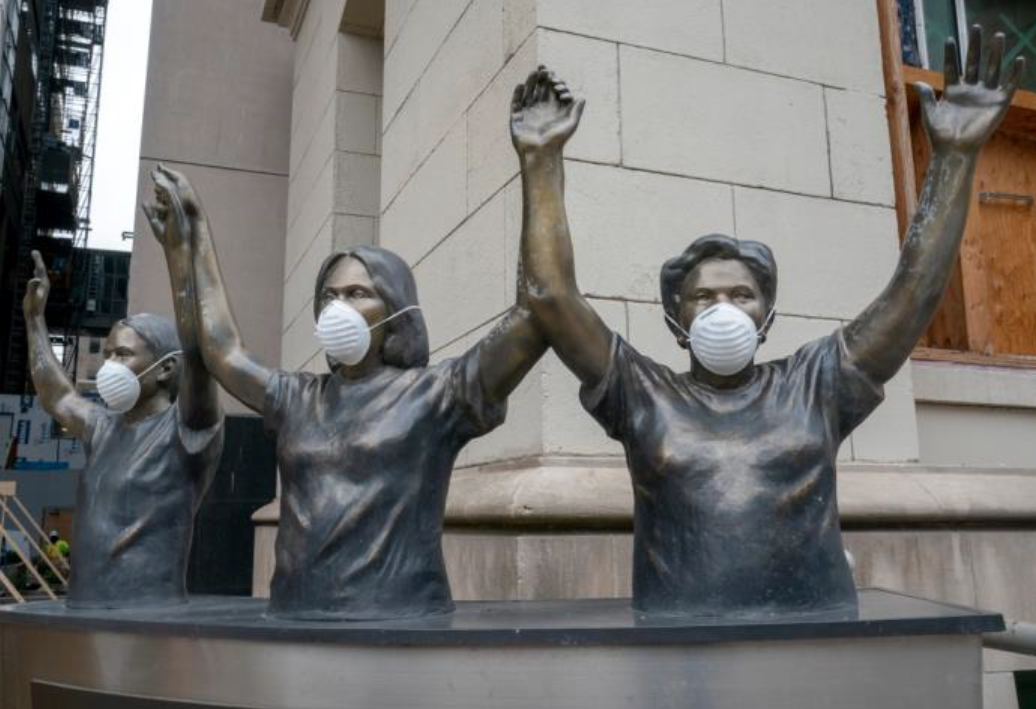 Masked Statues outside of Mount Sinai Hospital.