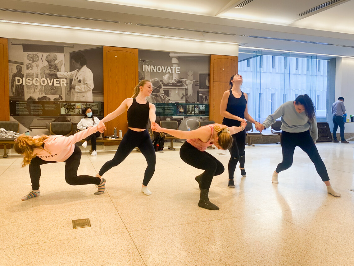 Dancers rehearse in the Naylor Student Commons at Temerty Medicine